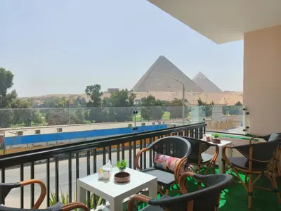 Maria Pyramids House